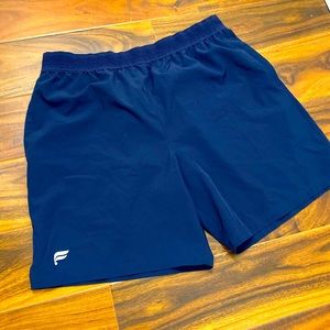 Fabletics shorts without liner. Great look and fit. Size large, fit comfortably.